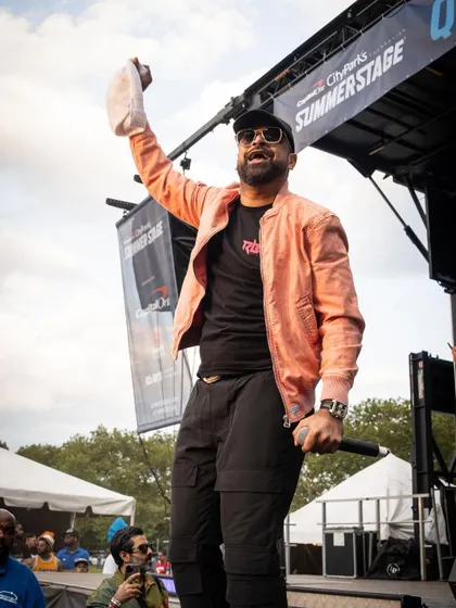 We bring out special guests to make the night unforgettable. Here's Tesher on stage, bringing his unique energy to the Basement Bhangra Bacchanal crowd.