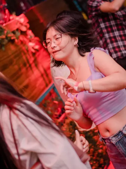 A candid shot of someone dancing and having a great time. These are the moments I play for.