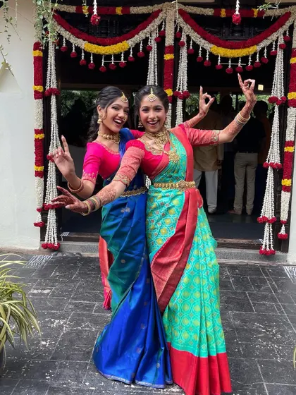 Playing dress-up for a wedding. As sisters and dance partners, we love celebrating together, and Indian weddings are the perfect occasion to embrace our love for traditional sarees and jewelry.