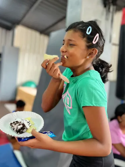 A happy moment with a plate full of goodies. We believe in balancing hard work with fun rewards.