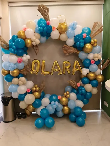 A clear, centered shot of the personalized "Olara" balloon ring.