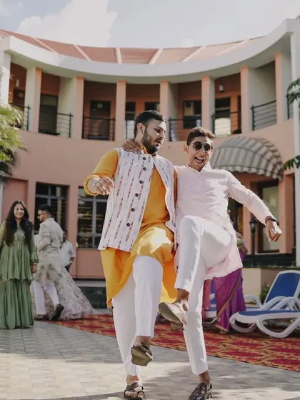Friends and brothers bringing the energy with their dance moves at an outdoor pool-side Mehendi. Our choreography is adaptable to any space, indoors or outdoors.
