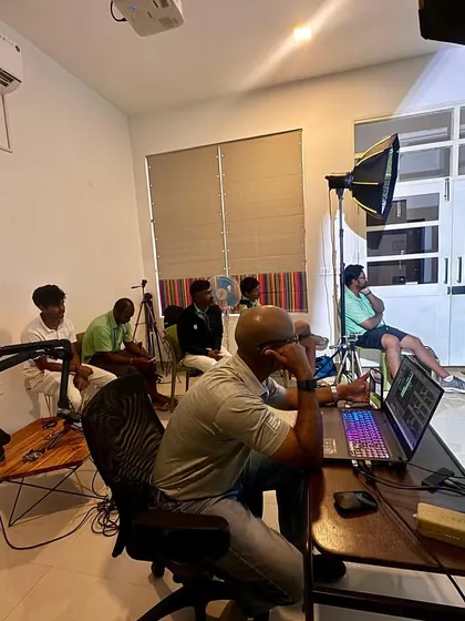 Our coaching team observing a player's session in the performance lab. This collaborative approach ensures that multiple expert eyes are analyzing the data, leading to more comprehensive and effective coaching strategies.