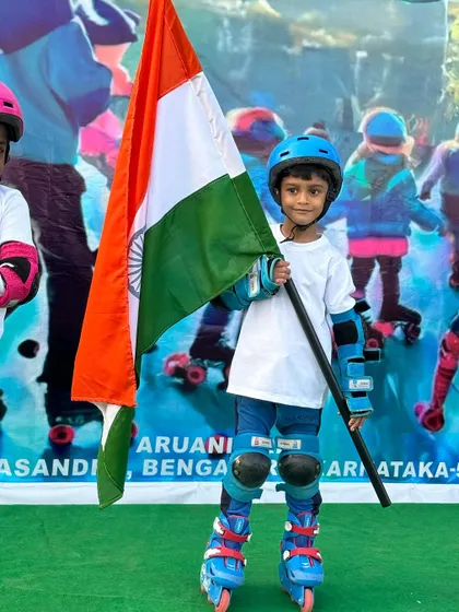 A young skater proudly holding the Indian flag at Skatethon 2024. These events are about more than just skating; they're about community and patriotism.