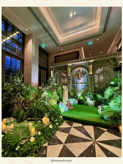 Where tradition meets couture. This mandap, designed for a wedding at Fairmont Mumbai, was imagined as a modern enchanted forest. I used a dense layering of lush greens, architectural ruins, and soft candlelight to create a sacred space that felt both majestic and deeply intimate.