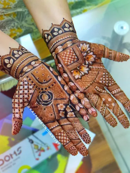A classic Indian henna design with a mix of floral and geometric patterns.