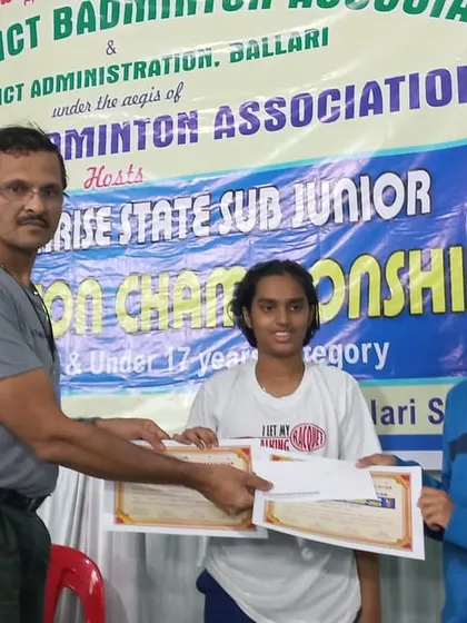 Jahnavi and her partner receiving their semi-finalist certificates. A great achievement in a highly competitive tournament.