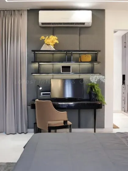 This angle shows the functional aspects of the bedroom, including the integrated study desk and the entrance to the walk-in wardrobe. The design ensures every inch of space is used effectively.