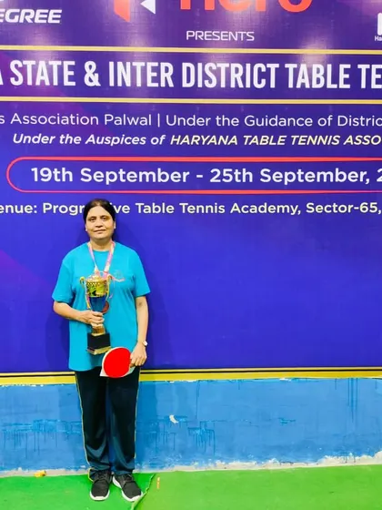 We celebrate players of all ages. Here, one of our senior players is recognized for securing 3rd place in the Haryana State Championship, proving that passion has no age limit.