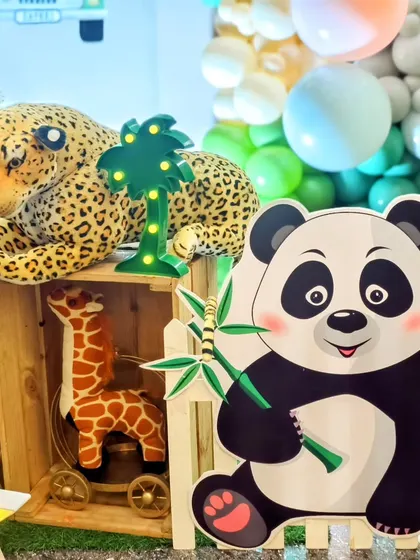 A close-up of the cute panda and leopard props used in one of my jungle setups.