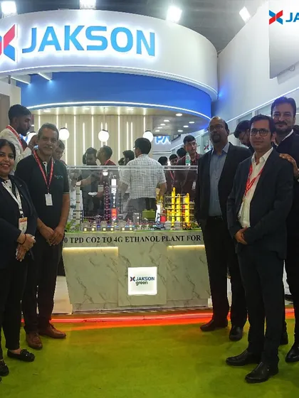 Our team showcasing a model of a CO2 to 4G Ethanol Plant at our booth. This highlights our diversification into biofuels and our role in the green energy ecosystem.