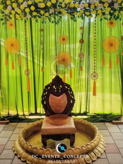 We love bringing traditions to life, like this vibrant Haldi ceremony setup. The combination of lime green drapes, marigold hangings, and a traditional brass urlu creates a festive and auspicious setting.