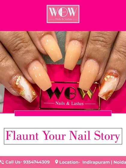 These coffin-shaped extensions feature a beautiful marble effect with delicate gold foil accents. This design showcases how we combine different techniques to create a truly unique and luxurious set of nails.