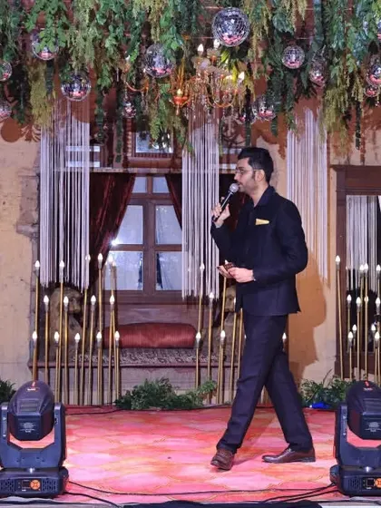 Another shot of me owning the stage, mic in hand, ready to take the celebration to the next level.
