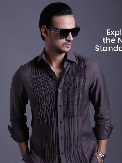 Not loud, not trying, just right. This grey shirt with a detailed, textured placket is the new standard in refined casual wear.