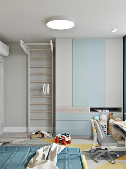 The room also includes a fun climbing ladder, encouraging physical activity and adding a playful element to the design.