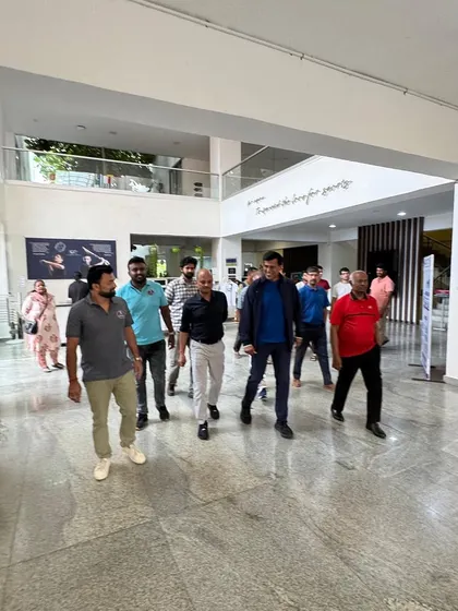 Officials and dignitaries, including Vimal Kumar and Sanjay Mishra, touring the venue. Our tournaments are held at top-class facilities that meet the standards required for national-level competitions.