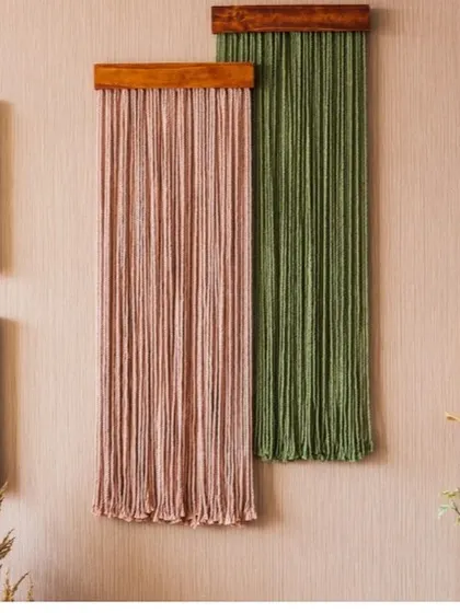 A wider view reveals how our macrame wall sculptures integrate seamlessly into a living space. Placed alongside houseplants and other decor, they bring a soft, organic element that warms up the entire room.