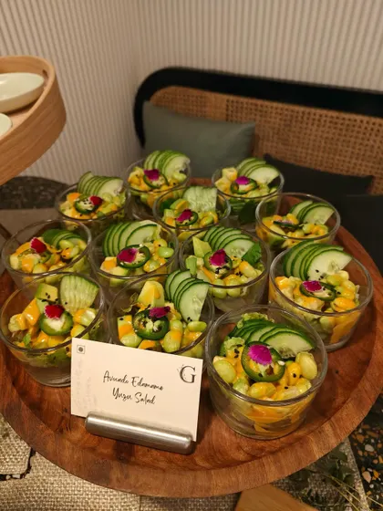Individual cups of our Avocado Edamame Yuzu Salad. This refreshing and healthy option is perfect for guests to enjoy while mingling at a party.