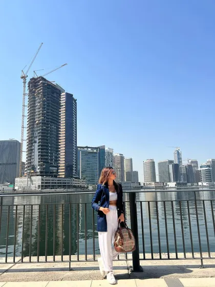 Taking in the Dubai skyline. A well-fitted blazer is a travel essential that can instantly elevate any casual outfit.