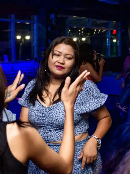 Getting into the groove on the dance floor. The music is always a mix of popular tracks to keep everyone moving.