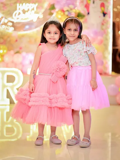 The birthday girl posing with her friend. I make sure to capture these important childhood friendships.