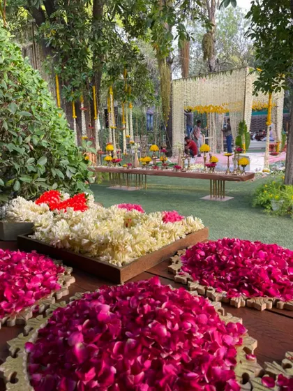Trays of fresh flower petals, including roses and jasmine, ready for the celebrations. I believe in using natural elements to add fragrance and beauty.