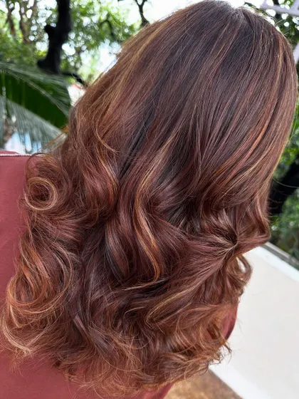 Travel ready with a new cut and color. This style will look great from the plane to the party.