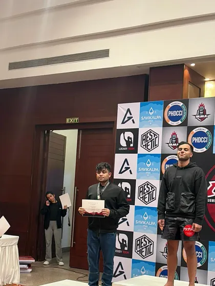 A candid shot of the podium ceremony. The real win is having the courage to compete and put your training to the test.