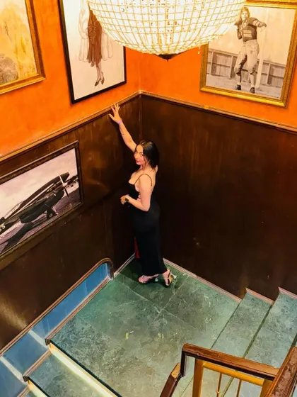 I hate being stared at, but I understand. A dramatic high-angle shot on the stairs, creating a powerful and artistic image.