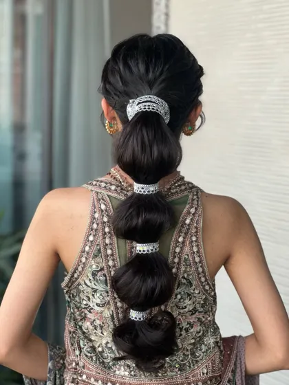 A detailed shot of the hair styling, showing how a great hairstyle completes the entire look for any special occasion.
