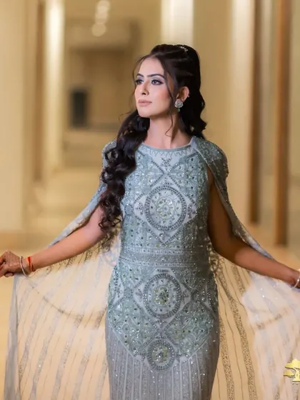 A stunning solo shot of the bride-to-be in her elegant engagement gown.