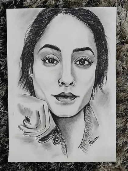 A charcoal pencil sketch focusing on capturing a subject's direct and soulful gaze. I use fine lines and soft shading to bring a sense of depth and realism to the portrait.