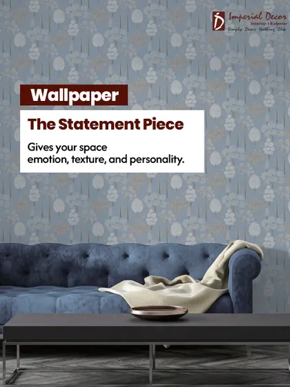 Wallpaper is the statement piece in any room. It gives your space emotion, texture, and personality, like this beautiful blue floral wallpaper that sets a calm and inviting tone for the living room.