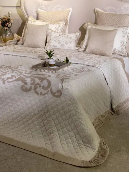 The Magnolia-Themed Bed Cover Set, styled with a breakfast tray. The cushions feature tone-on-tone quilting and contrast piping, all thoughtfully created by our in-house textile designers.