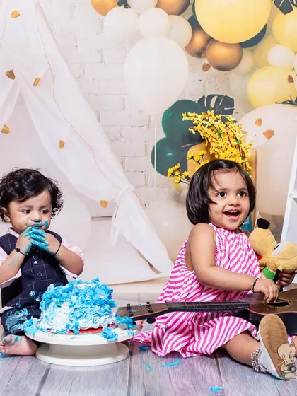 A fun and messy half-birthday cake smash with two little ones. Capturing these spontaneous moments of play and curiosity is what makes these sessions so memorable.