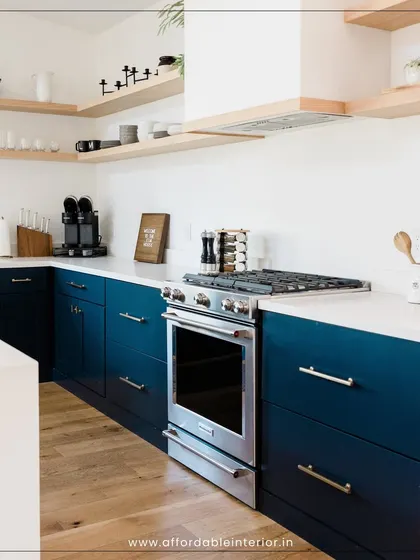 A beautiful modular kitchen with deep blue lower cabinets and open wooden shelving, creating a stylish contrast that is both modern and warm.