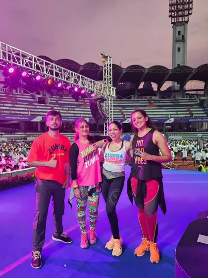 Posing with our amazing team of Zumba instructors. Together, we create an unstoppable force of energy and positivity.