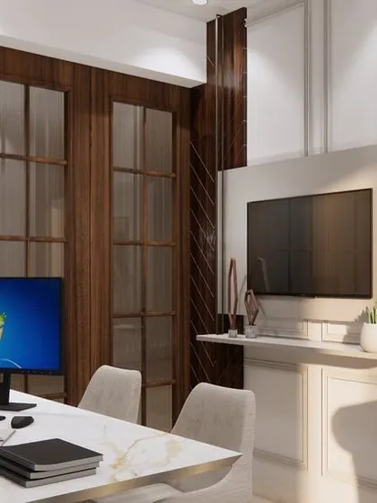 A modern home office design featuring a sleek marble-top desk and wood-paneled walls. The space is bright and clean, with a professional yet comfortable feel.