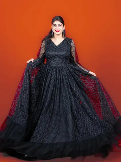 A classic and sophisticated black gown, available for rent for functions or photoshoots.
