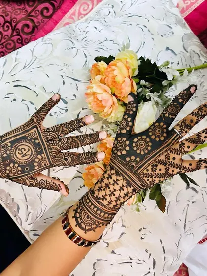 Another angle of the contrasting traditional designs, showing how different patterns can work together to create a unique and personalized look for a client.