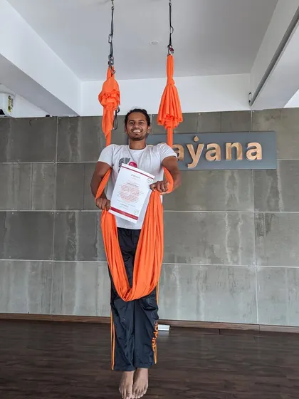 Another happy graduate, certified and ready to share the magic of aerial yoga with the world.
