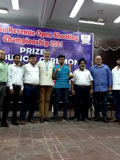 A proud moment with the winners and my team at the 4th Indian Revenue Open Shooting Championship. Managing large-scale events with participants from different states is a core part of my service.