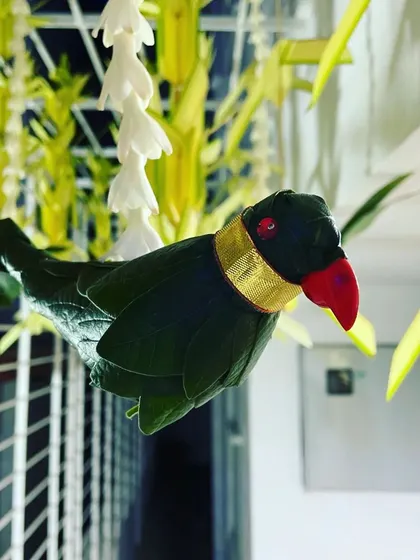 I believe in the beauty of details, like this handcrafted parrot made from fresh leaves with a gold band. This small, traditional element was part of the hanging decor for a haldi ceremony, adding a touch of unique artistry to the event.