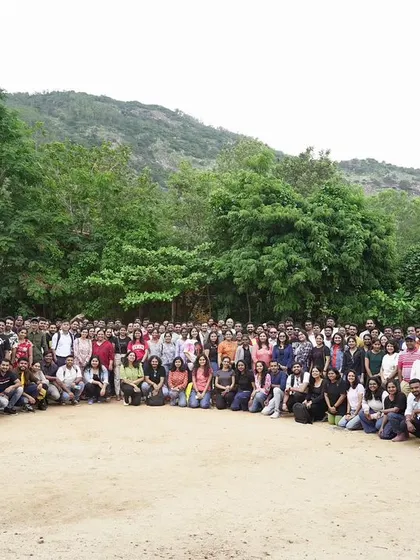 We specialize in bringing large groups together for memorable corporate outings. This is a snapshot of the Schneider Electric team enjoying their day of connection and fun against the beautiful backdrop of Nandi Hills.