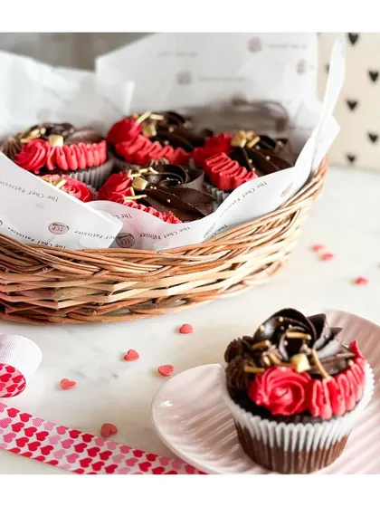 Our Cupid-approved cupcakes feature a spongy muffin base and rich dark chocolate frosting. They are a perfect little treat for Valentine's Day or any day you feel like celebrating love.