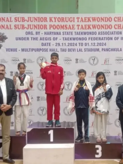 Naysha on the podium after winning a bronze medal at the 38th Sub-Junior National Kyorugi Taekwondo Championship in Panchkula.