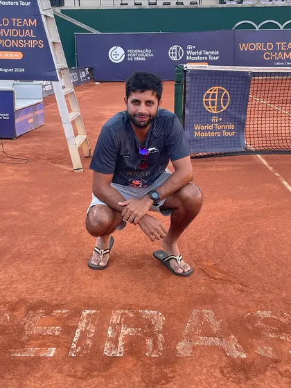 Taking a moment to soak it all in on the clay courts in Oeiras, Portugal, during the World Team & Individual Championship. Competing internationally is an unforgettable experience.