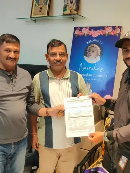 Our team hands over a solar agreement to a new customer.