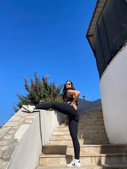Taking my stretches to the stairs. You don't always need a mat to move your body and feel good.